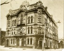 Sepia-toned photo of the first Whitney's Grand Opera House, taken from the southeast corner of Fort Street and Shelby Street facing northwest