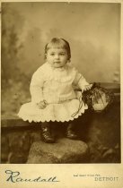 Sepia-toned cabinet card portrait photo of Maurice W. Fox