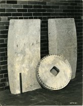 Black and white photographic print depicting two Detroit Electric Furnace Company slabs and a Holcroft & Co