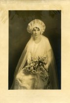 Sepia-toned wedding portrait photo of Julia Miller, on September 4, 1924 in Quenemo, Kansas