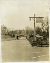 Black and white photographic print of a road entering Bronxville, NY