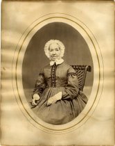 Mounted sepia-toned half-length portrait photograph of Harriet Lindsay Lodge, grandmother John Christian Lodge