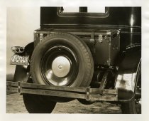 Black and white photograph of a rear view of a 1929 Packard Motor Car Co