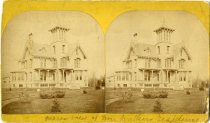 Card bearing a sepia-toned stereoscopic photograph of the exterior of the home of Edward C. Walker