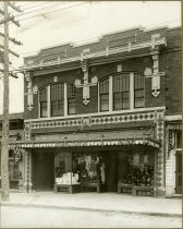 One sepia-toned photograph of a row of commercial/office buildings on the west side of Woodward Avenue (opposite the J