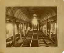 Black & white photographic print depicting the nave of the former Ste. Anne de Detroit Catholic Church