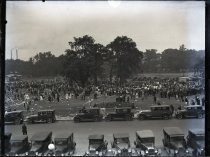 Monochromatic glass-plate negative taken from the top of the Belle Isle Casino overlooking the crowd assembled in the field to the north during the National Convention of the United Spanish War Veterans held on August 29, 1927