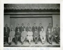 Black and white print of a group portrait photograph of the members of the Wolverine Funeral Directors Association, dated December 1929