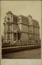 Cabinet card bearing a sepia-toned photograph possibly depicting the Walter S. Russel home