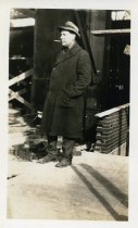 One sepia-toned photograph of Mr