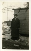 One sepia-toned photograph of Mr