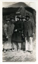 One sepia-toned photograph of a group of five workmen at the Herman Kiefer power house construction site