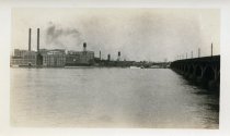 One sepia-toned photograph of the Detroit River at the downstream side of the Belle Isle Bridge