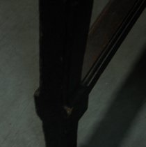 detail small chip on reverse right leg