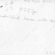 [Unidentified house with bicycle]