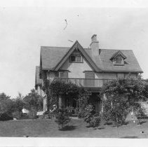 [Two men and a dog at the Jesse Lynch Williams House]