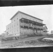 [Family on Second-Story Porch]