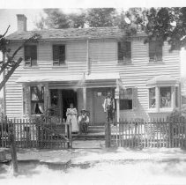 [Three People on Porch]