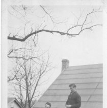 [Men by Stone Building]