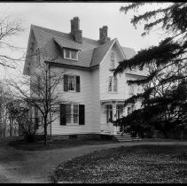 [Unidentified house with truck]