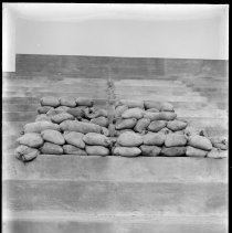 [Sandbags on structure, construction of Palmer Stadium]