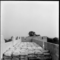 [Sandbags on top of structure,construction of Palmer Stadium]