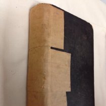 Front cover and spine repaired with brown tape