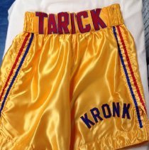 Yellow polyester satin boxing shorts with red & blue details