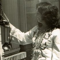 Mona Mulhair infront of shop