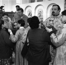Black & white photo of communion service at Antiochian Orthodox church