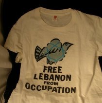 Tshirt w dove reading "Free Lebanon from Occupation"