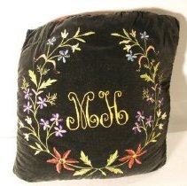 MH embroidered pillow