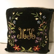MH embroidered pillow