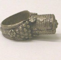 Silver ring with grape design on side