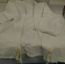 White wrap-style top for martial arts practice