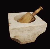 Stone mortar and wooden pestle