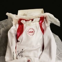 White and red leotard with autograph on right hip