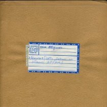 Brown cover with handwritten label