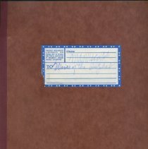Brown folder with handwriting label