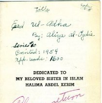Booklet with handwritten inscriptions in green and red ink