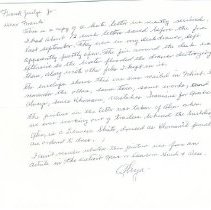 Handwritten letter in black ink on white paper