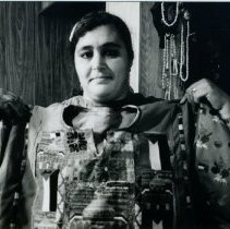 Black & white photo possibly of Halima w dress