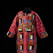 Long red dress with modern Palestinian embroidery