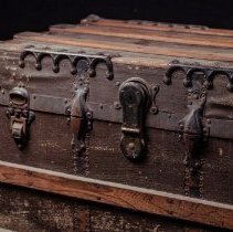 Close up detail of trunk latches and metal embellishments