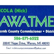 Business card in blue and bright green text