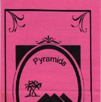 Pink paper menu printed in black with decorative designs