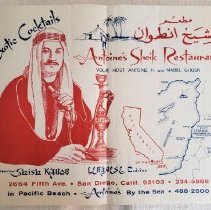 Placemat with image of man and maps