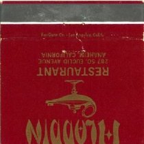 Red matchbook cover printed in gold ink w image of lamp & genies