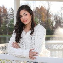 profile photo of Aya Islim posing by a fountain