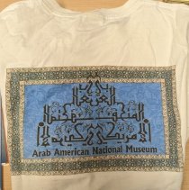 White t-shirt back w. image of AANM mosaic